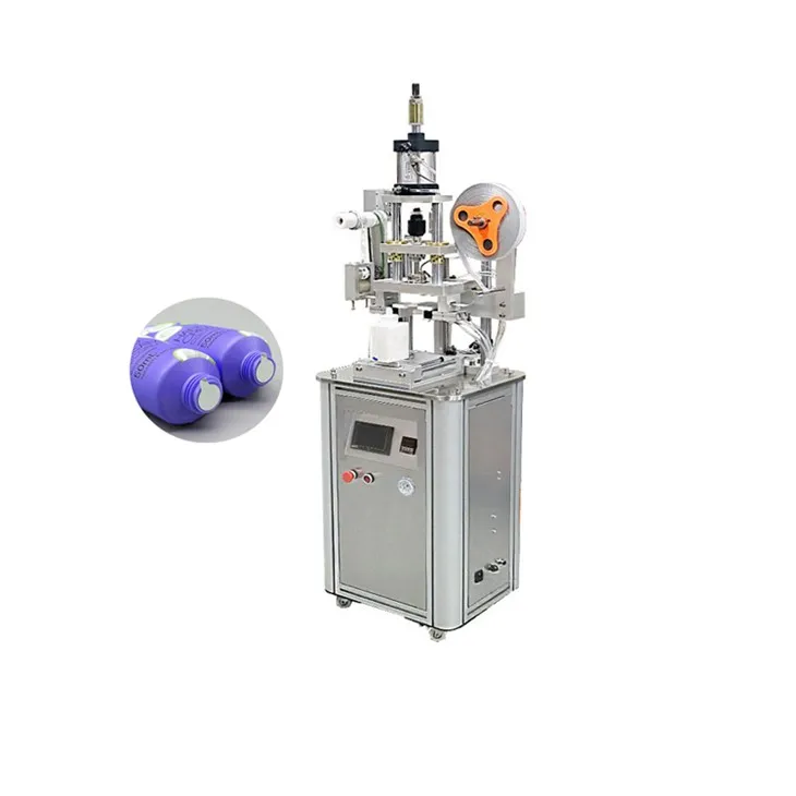 Máy dán giấy nhôm đầu ống bằng tay